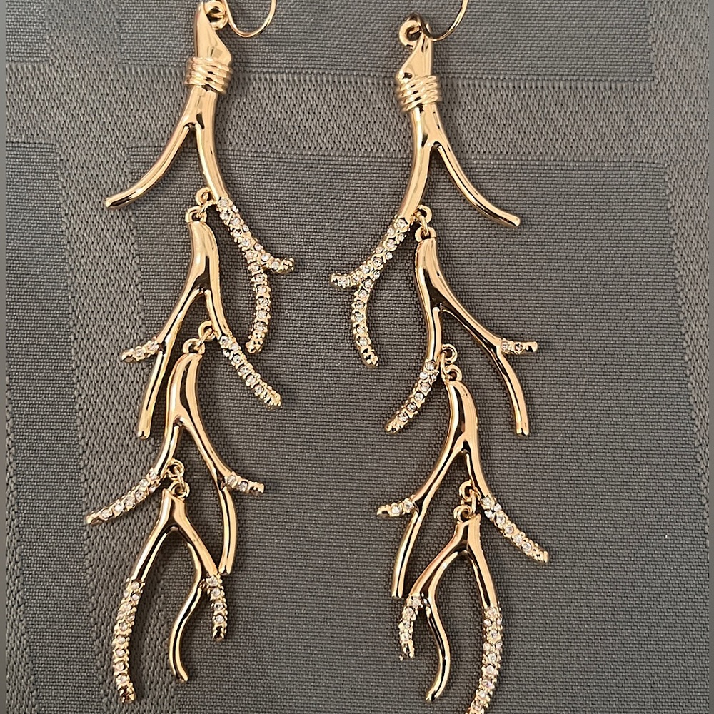 Coral like earrings with crystal stones.